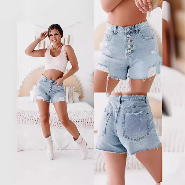 Woman wearing light blue denim shorts with a white background