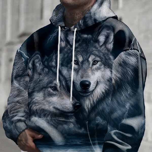 Hoodie with wolf design worn by a person, with a blurred background