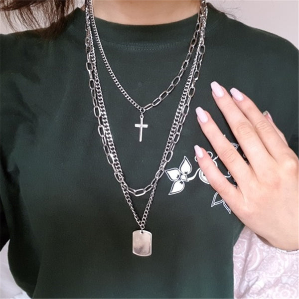 Multi-layered minimalist sweater chain for students by LuxeNova worn by a lady